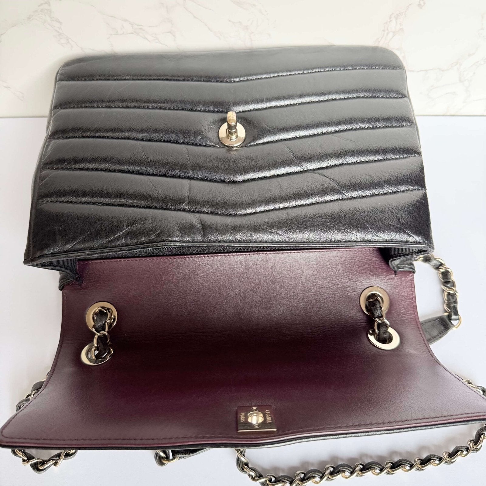 Chanel reversed chevron flap