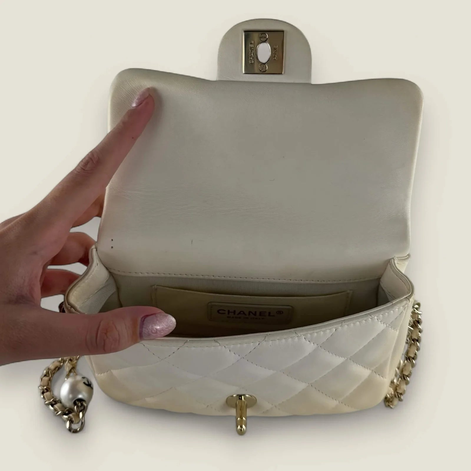Chanel bag logo and stitching detail