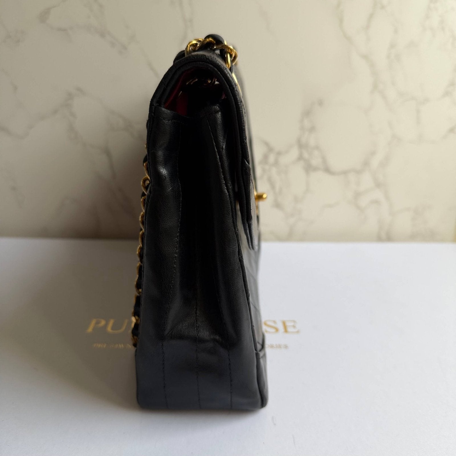 Chanel vintage bag black lambskin quilted pattern