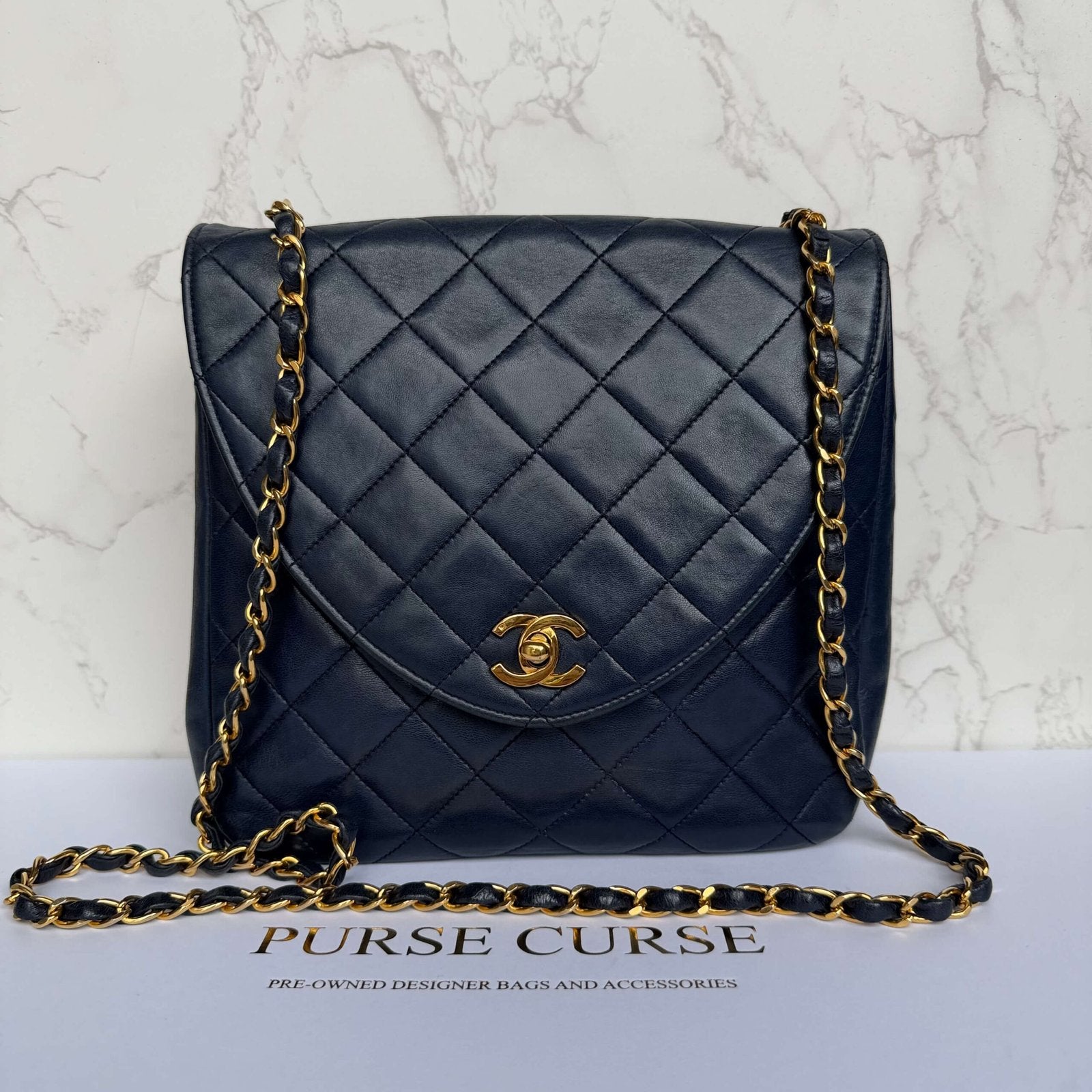 Chanel vintage crossbody flap bag navy lamsleer - pre-owned