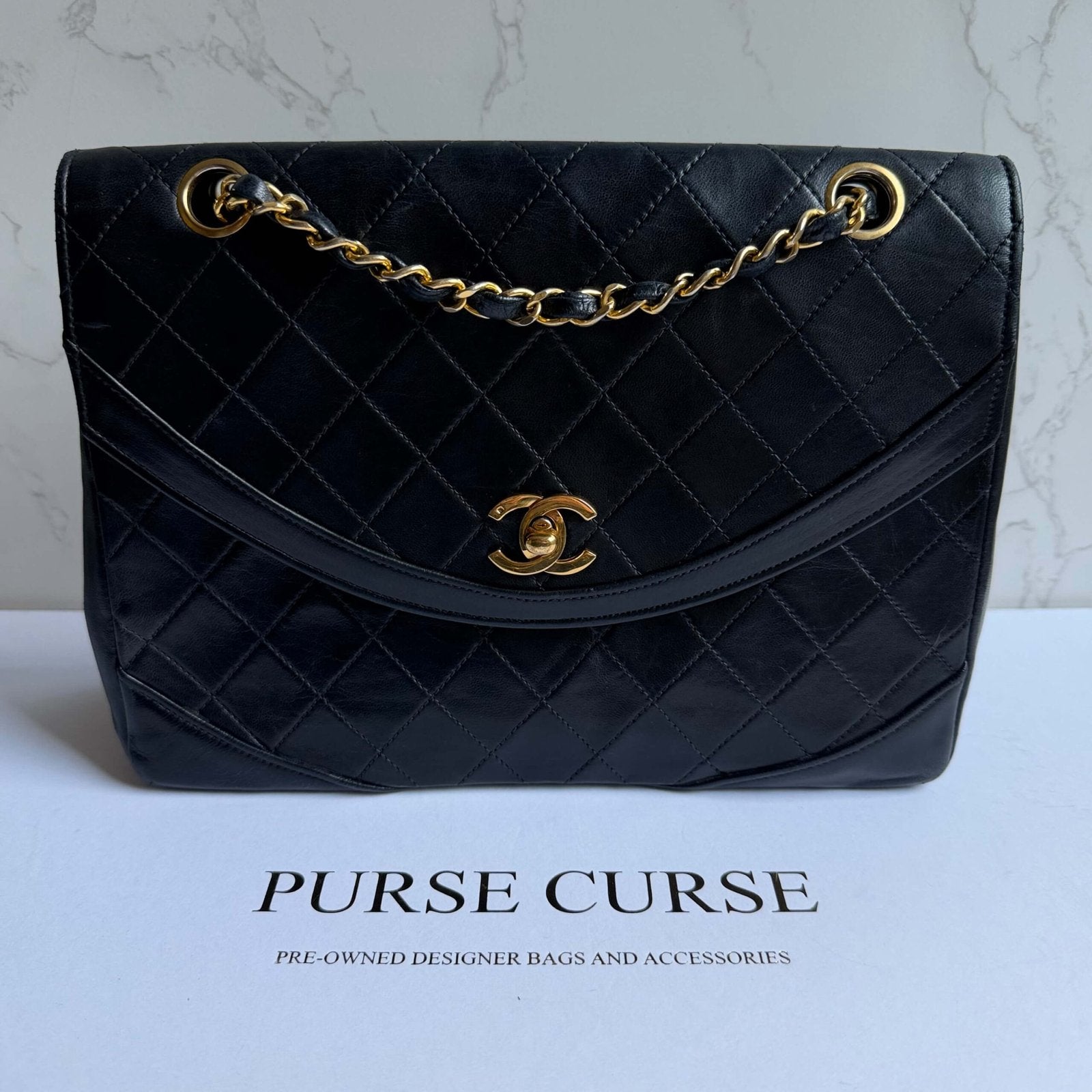 Chanel vintage double chain flap bag black lambskin with gold hardware