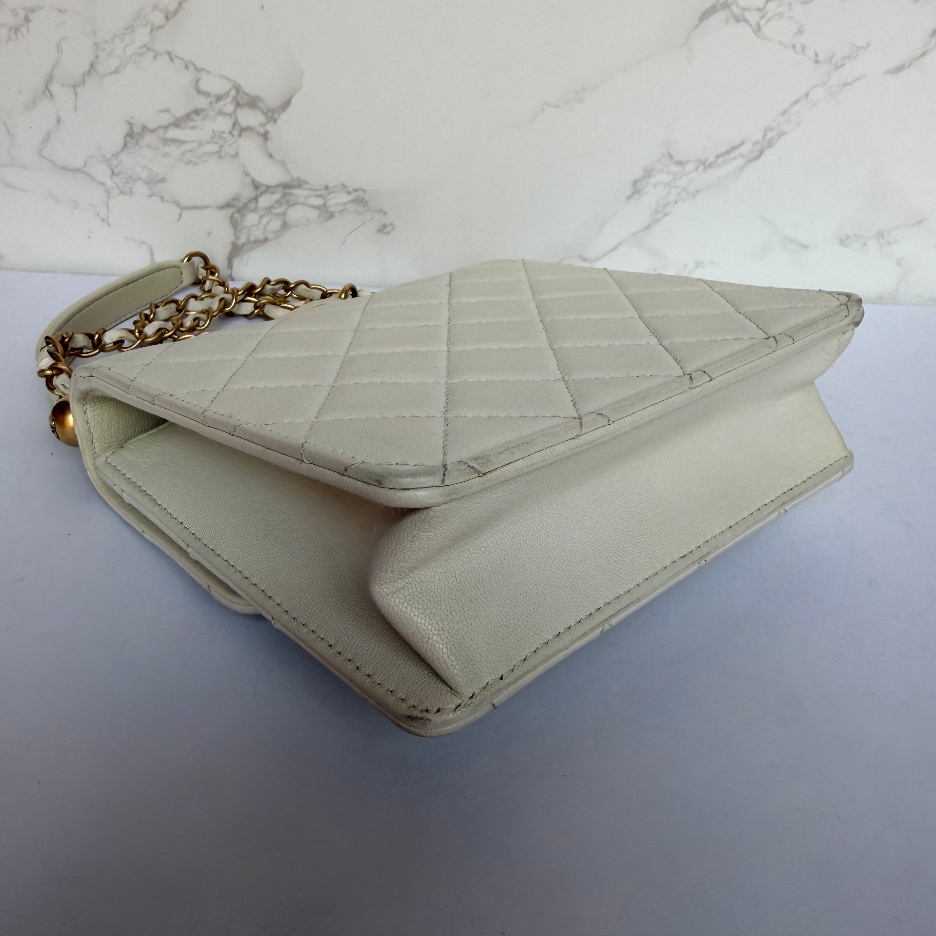 Chanel chic pearl flap bag