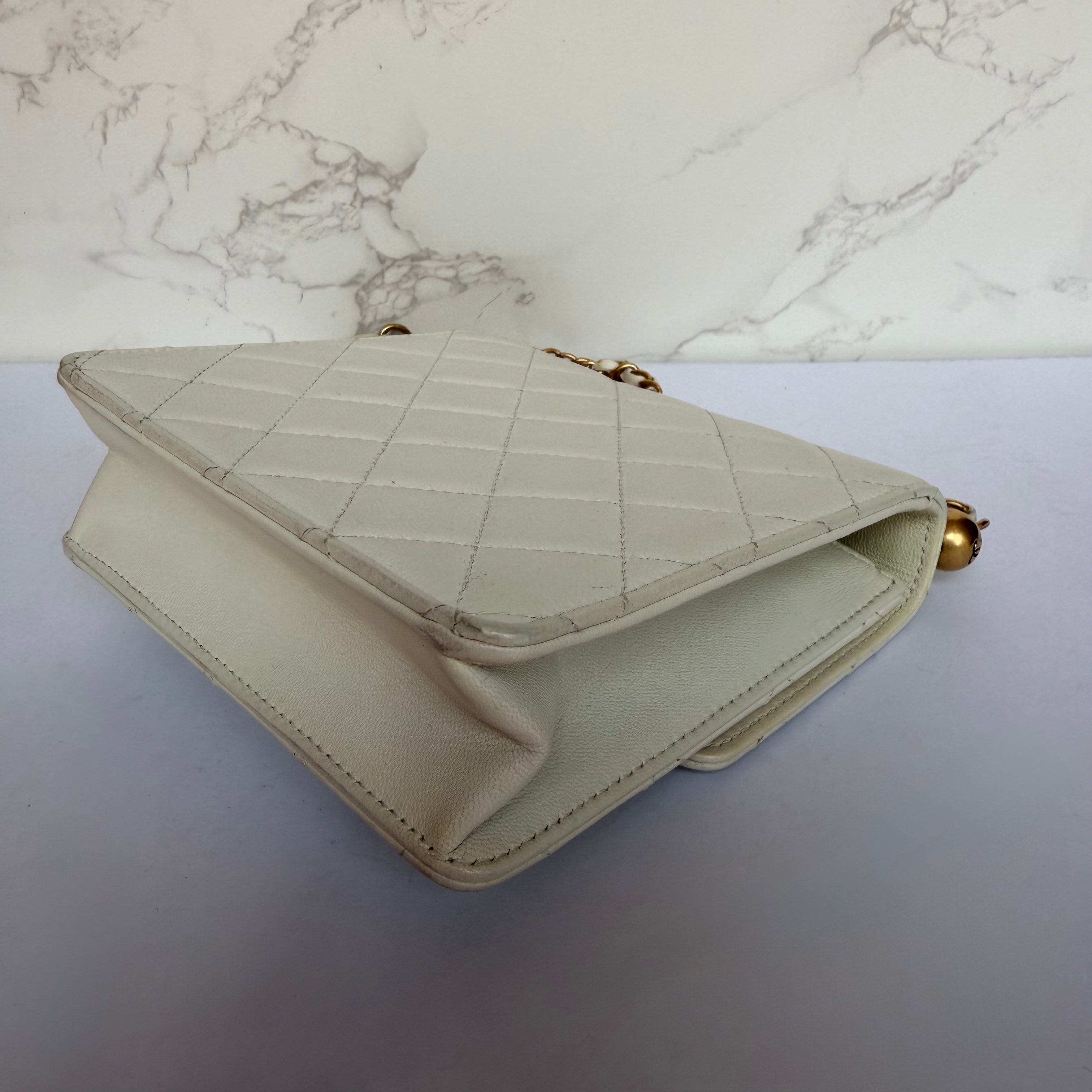 Chanel chic pearl flap bag