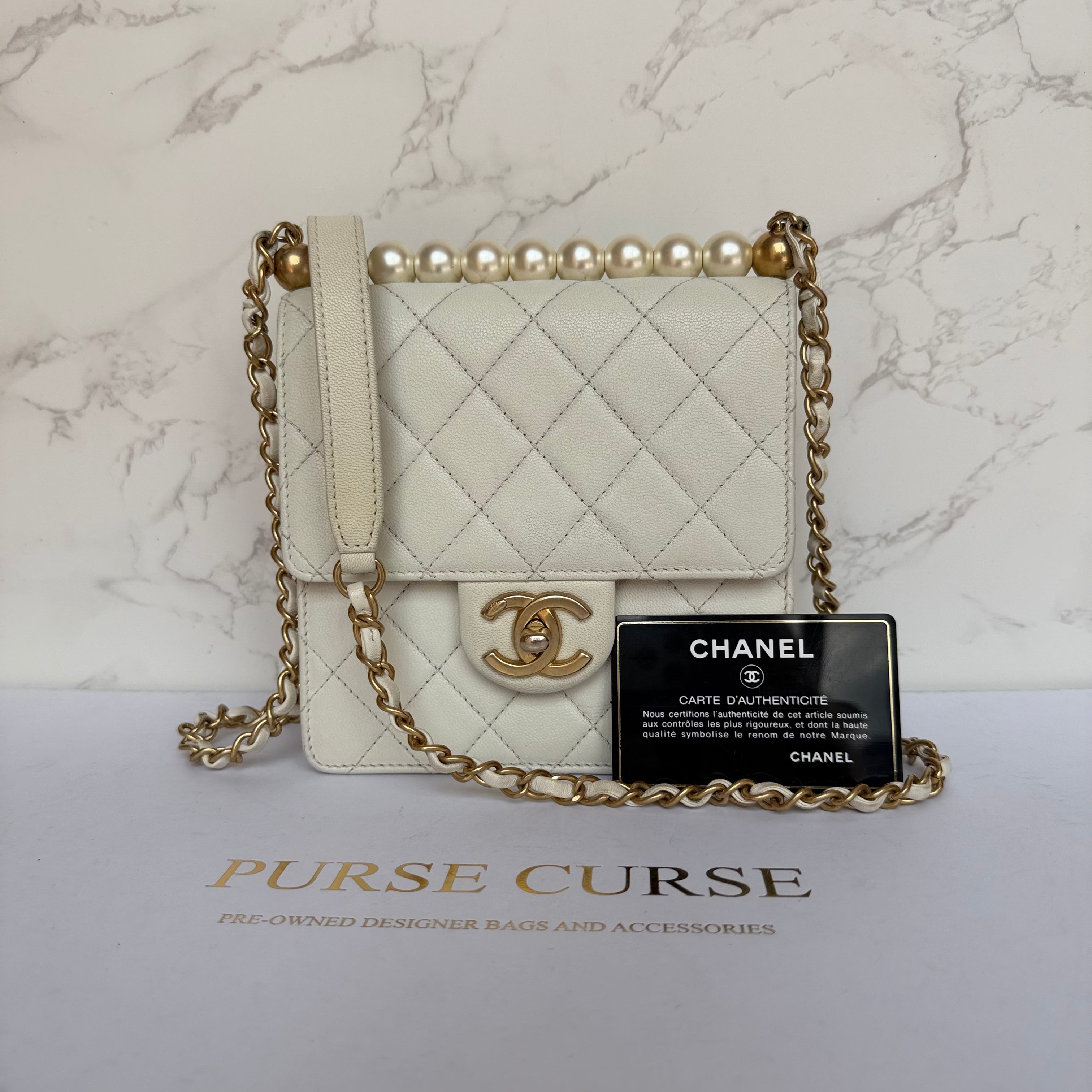 Chanel chic pearl flap bag