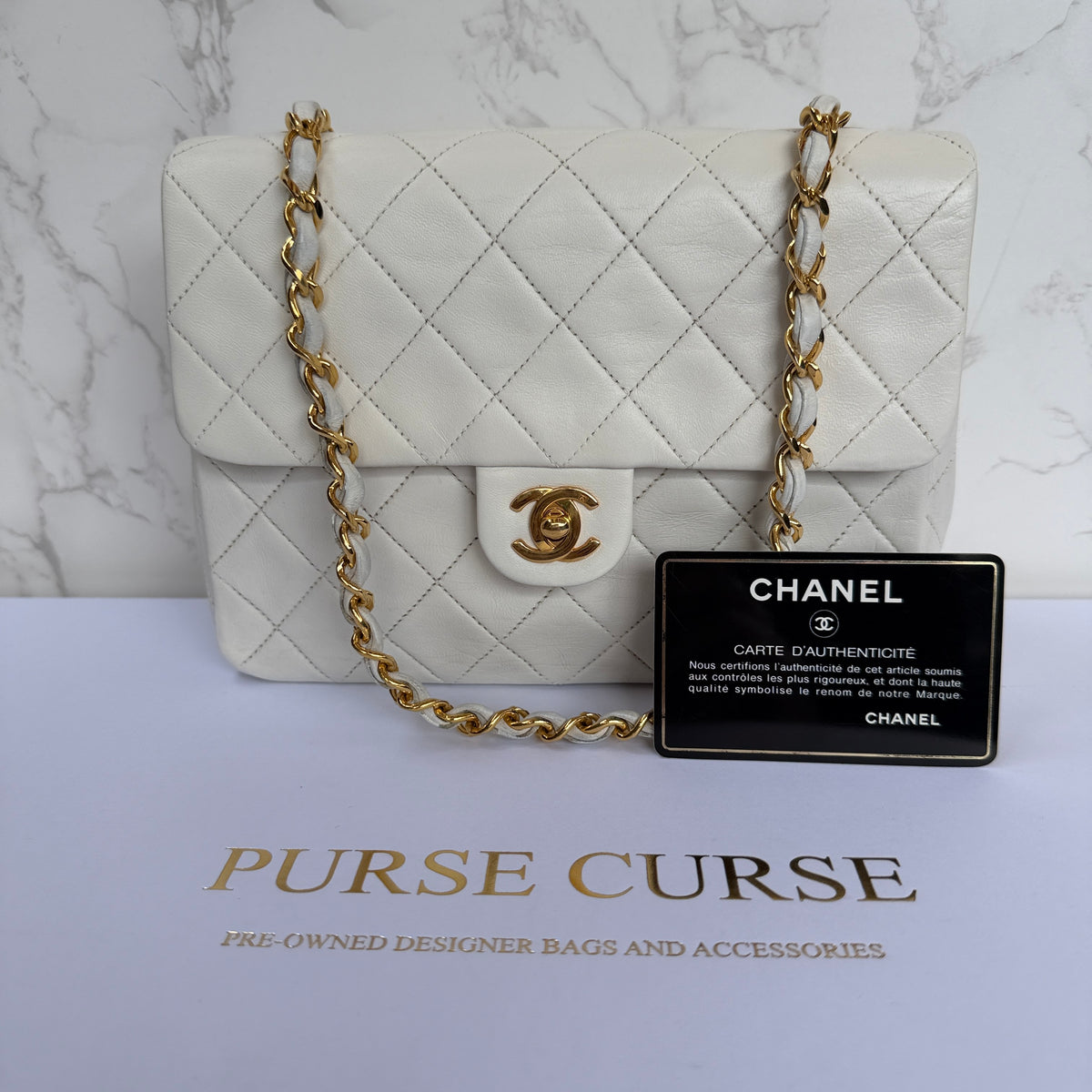 Chanel vintage mini classic flap wit lamsleer authenticiteitskaart