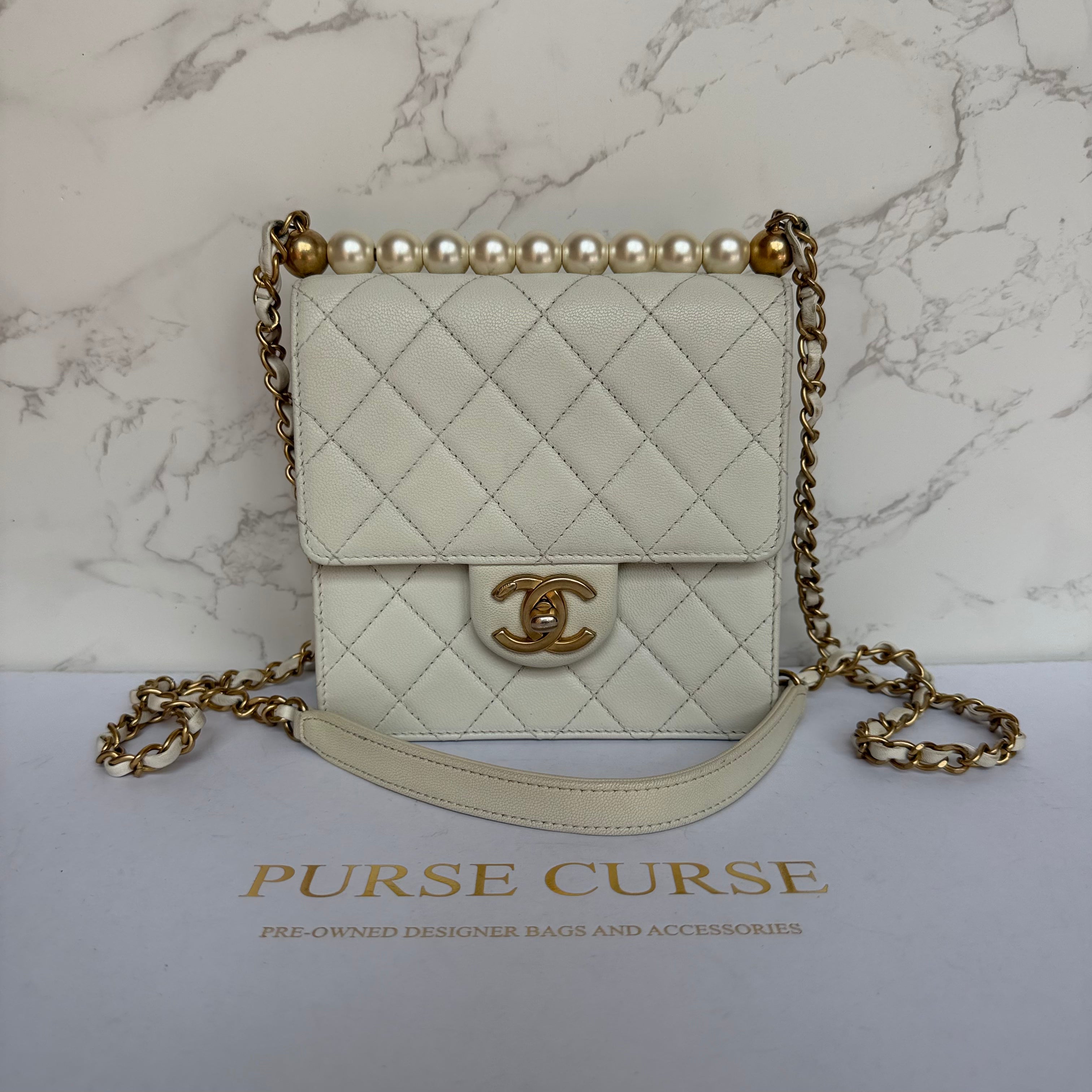 Chanel chic pearl flap bag
