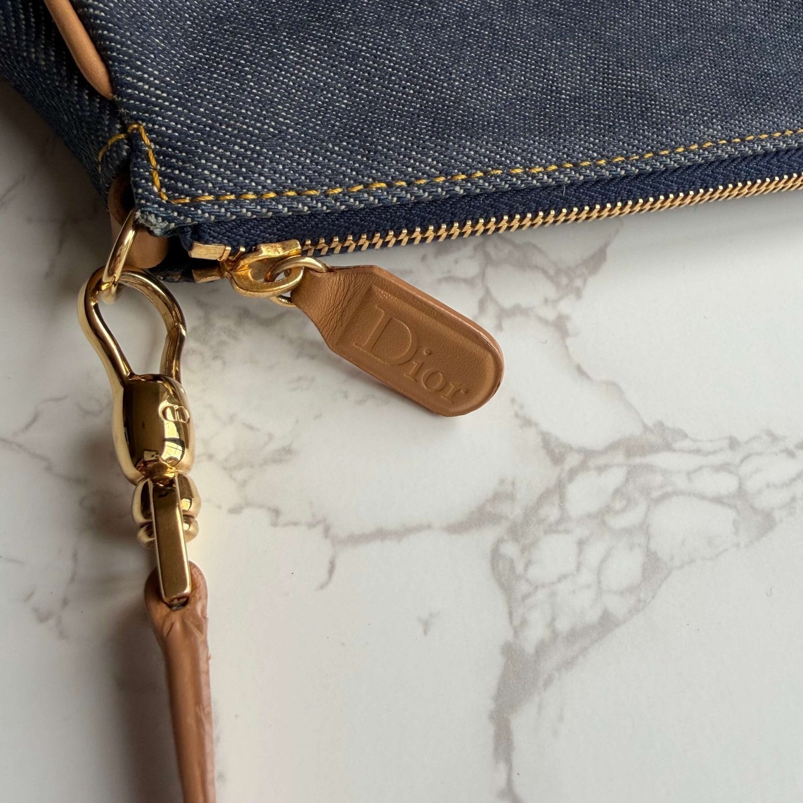 Dior denim saddle pochette close up