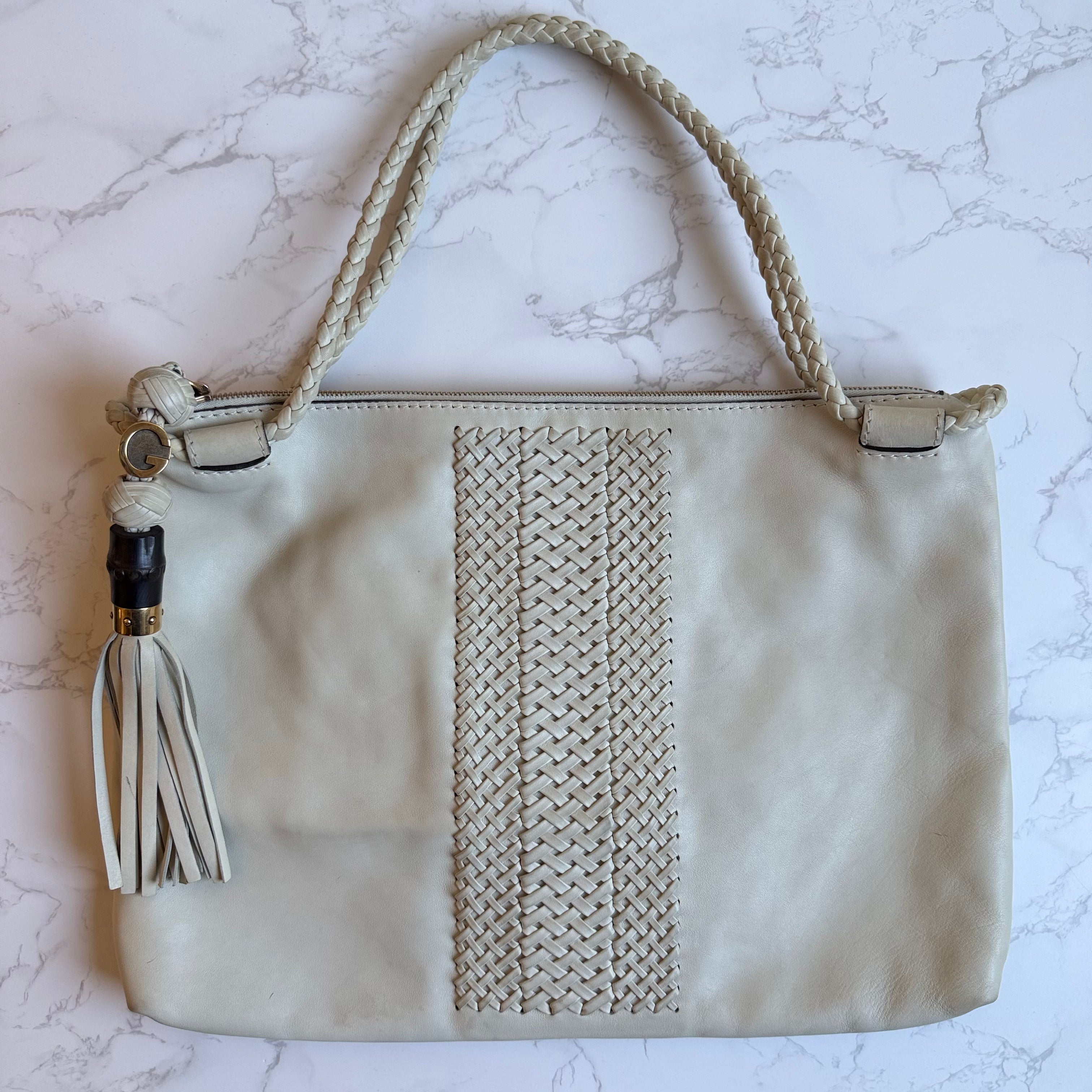 Gucci woven leather front detail beige bag