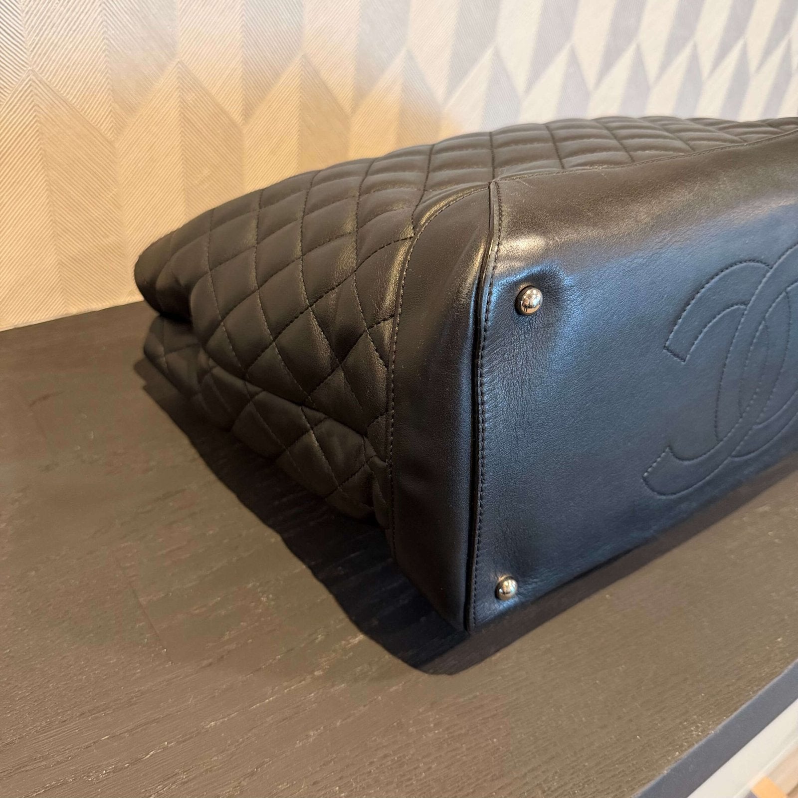 Corners of original Chanel calfskin quilted large shopping tote