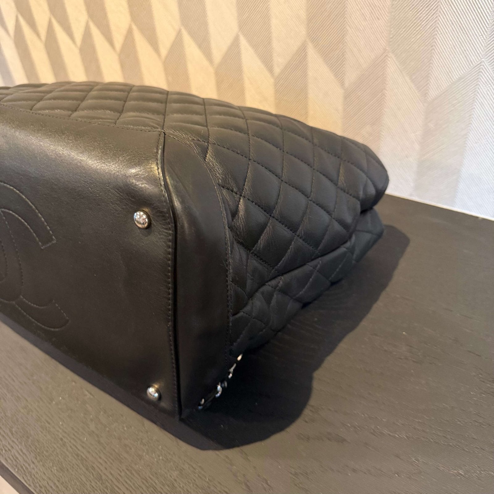 Corners of original Chanel calfskin quilted large shopping tote