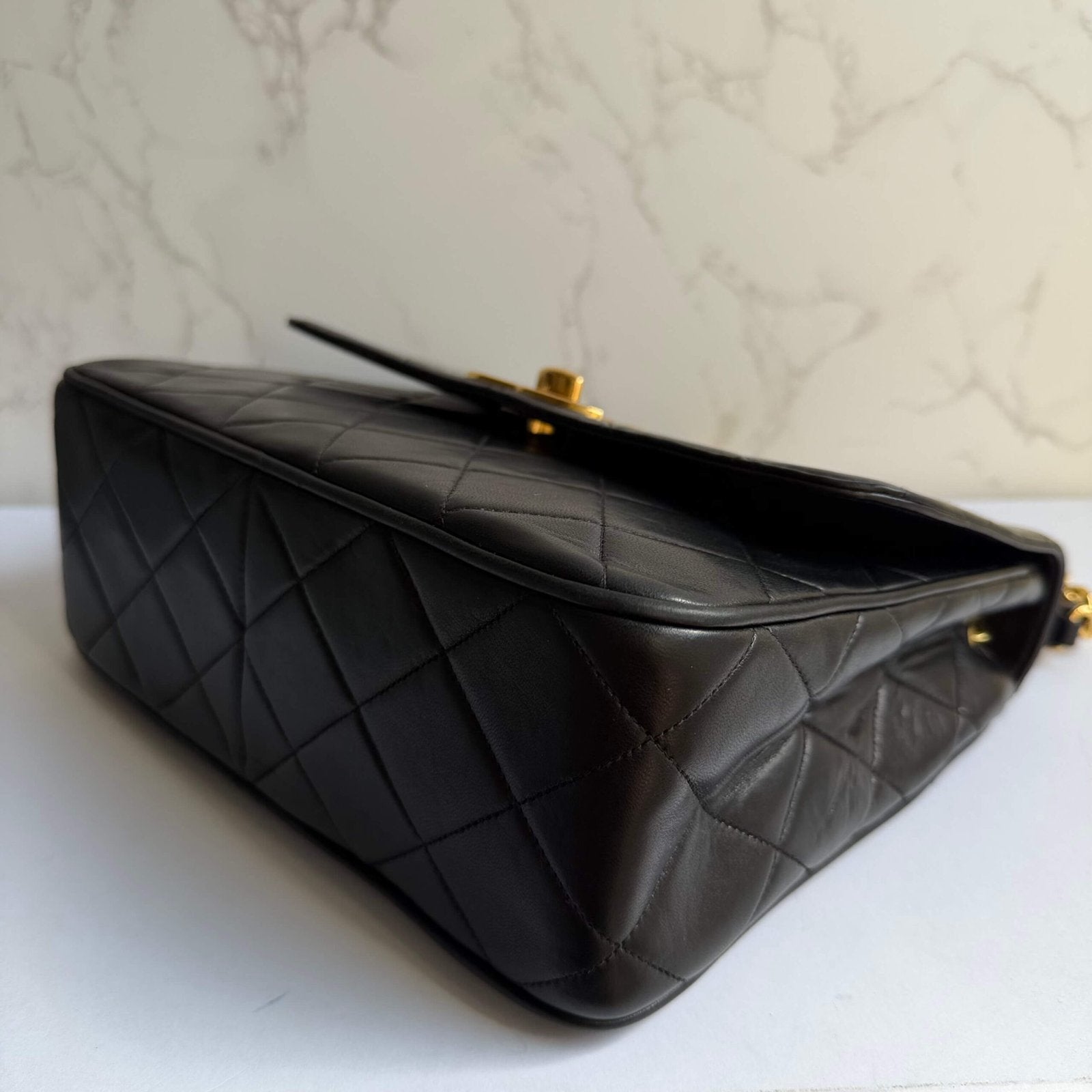 Corners of authentic pre-owned Chanel bag