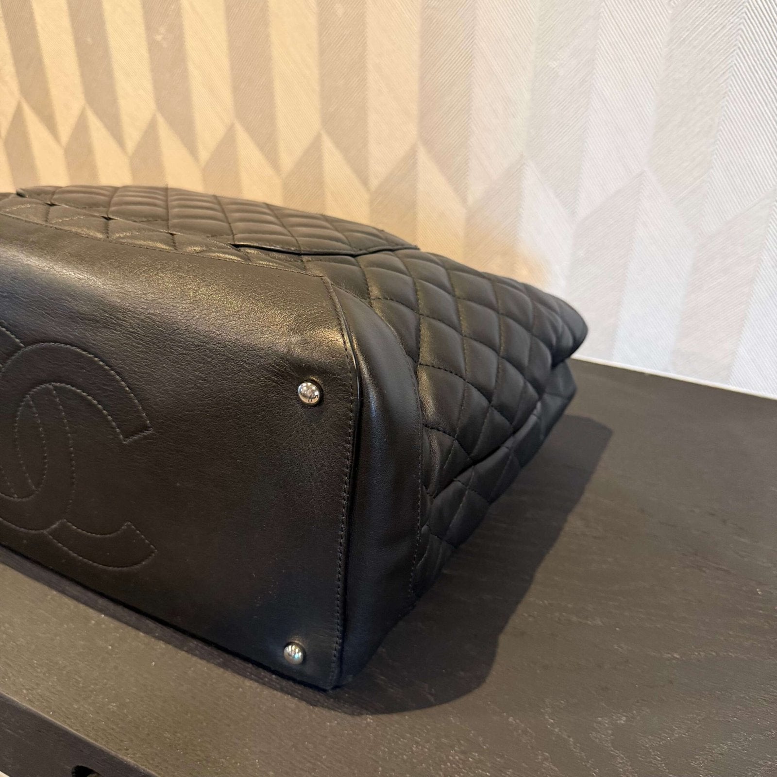 Corners of second-hand Chanel tote bag