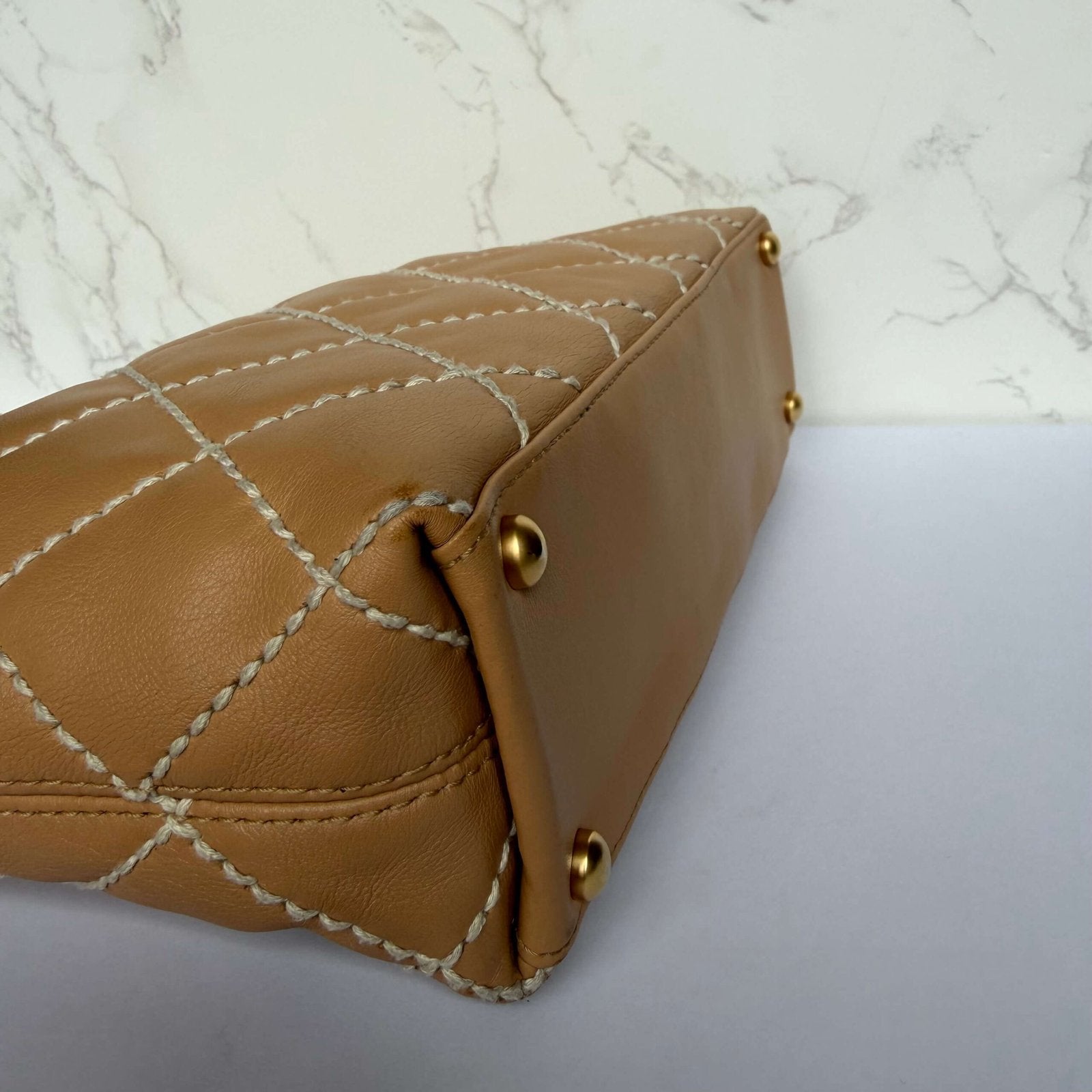 Hoekjes vintage Chanel handtas beige