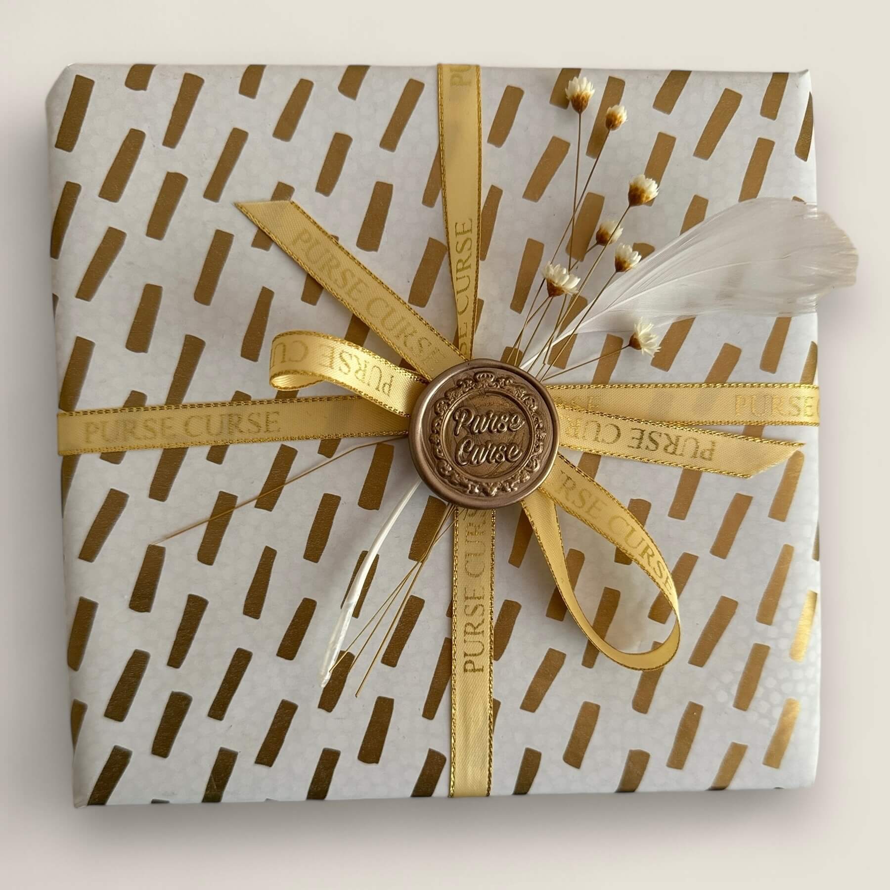 Wrapped gift Purse Curse designer bags