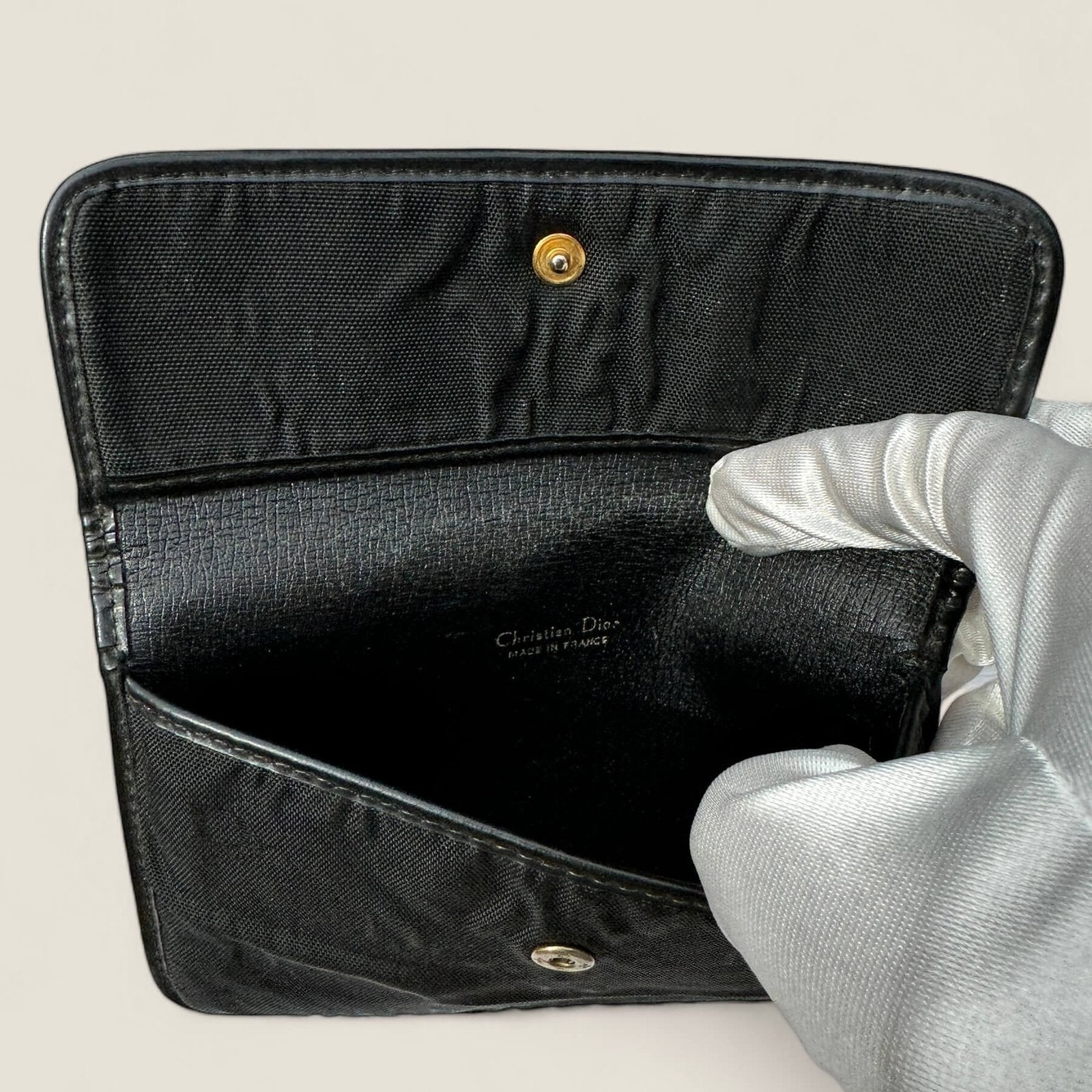 Inside second hand designer Christian Dior pouch