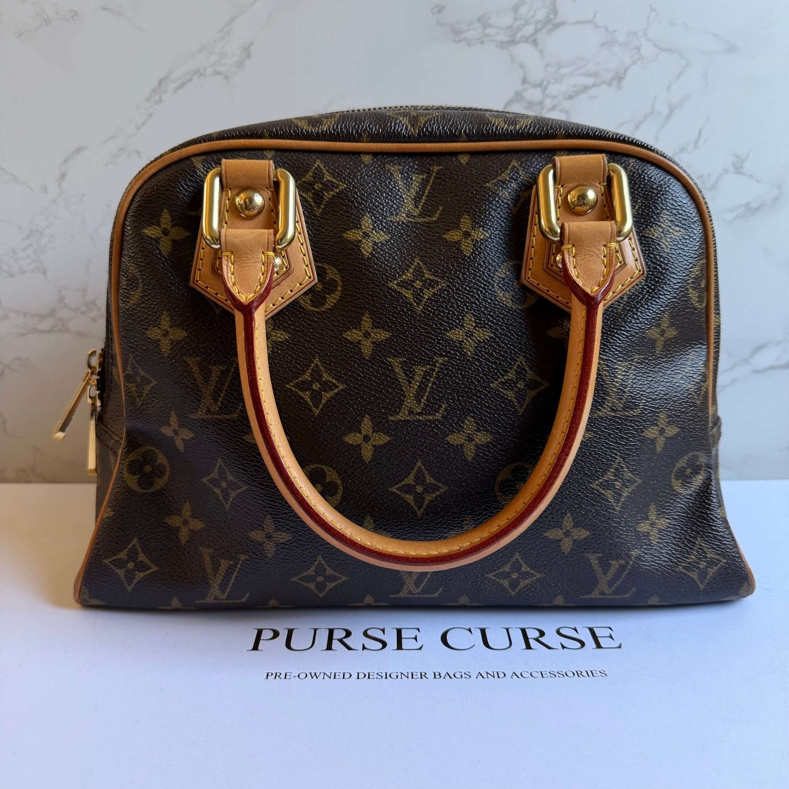 Louis Vuitton Manhattan PM luxury handbag