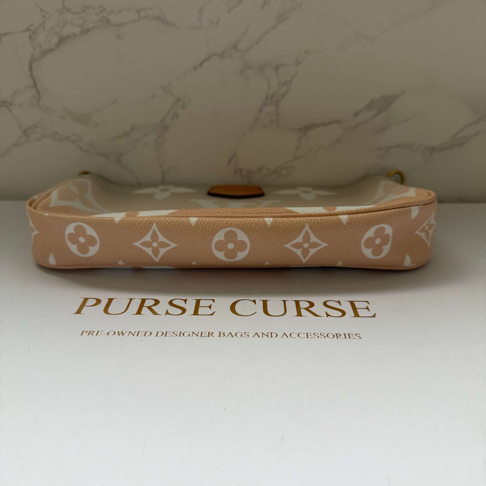 Louis Vuitton onderkant pochette accessoires