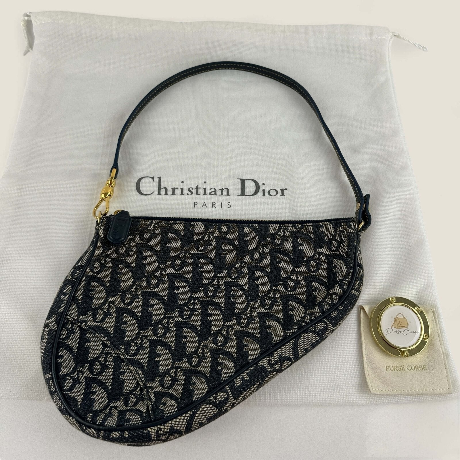 Pre-loved Christian Dior monogram canvas oblique mini saddle bag with Purse Curse bag hook and dustbag