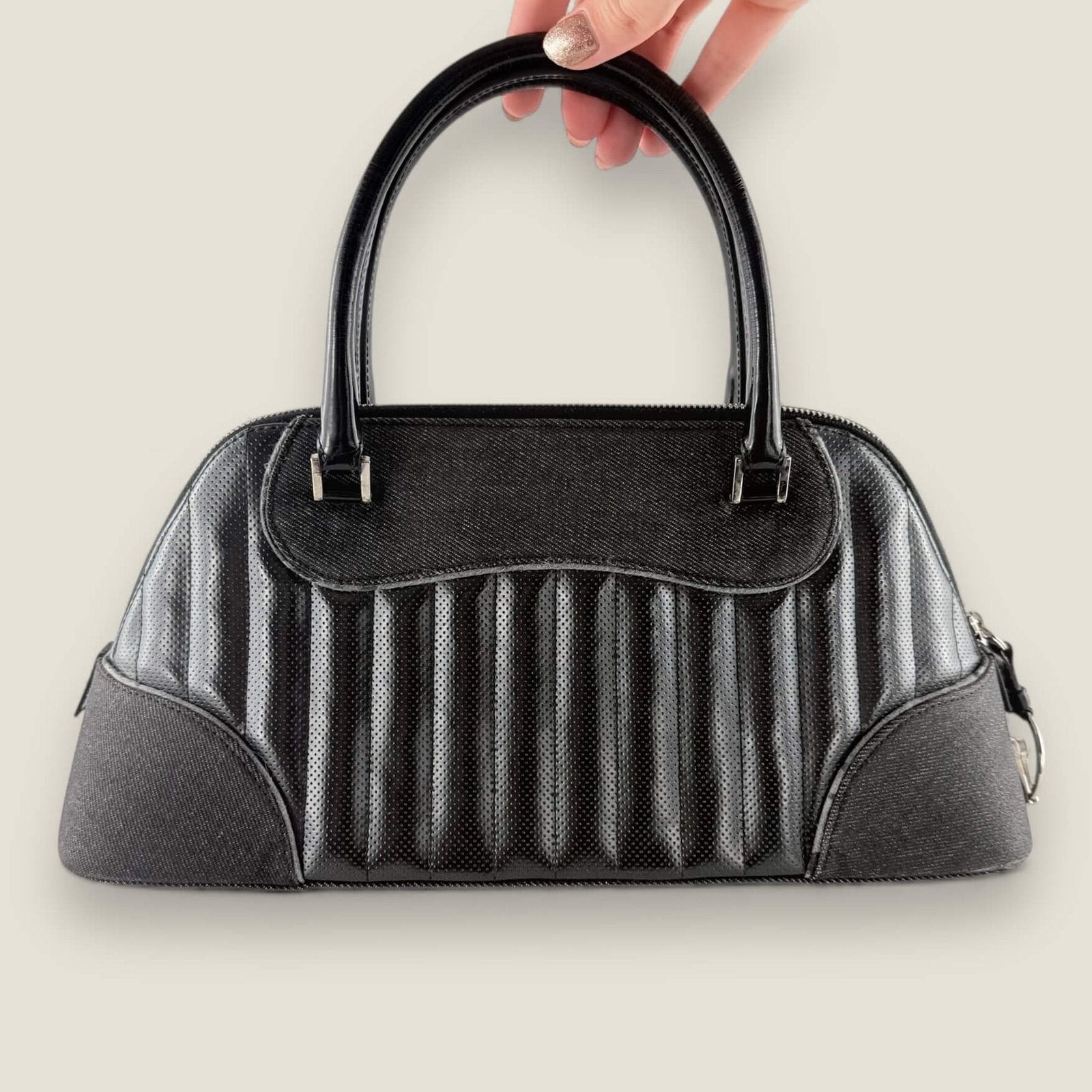 Pre-loved Christian Dior top handle bag retains its shape perfectly, a collector's favorite from the John Galliano era