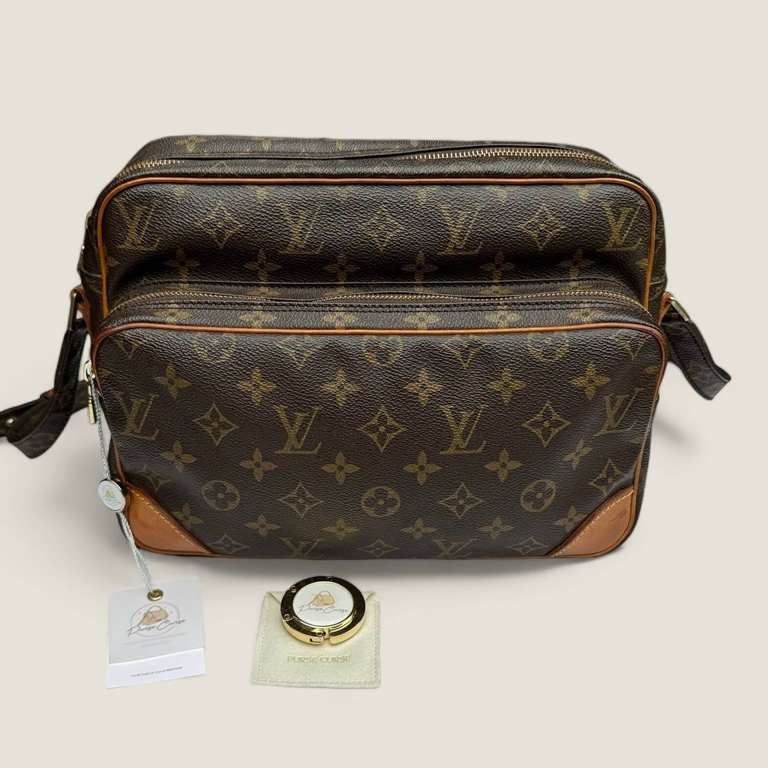 Pre-owned Louis Vuitton Nile bag with Purse Curse bagholder