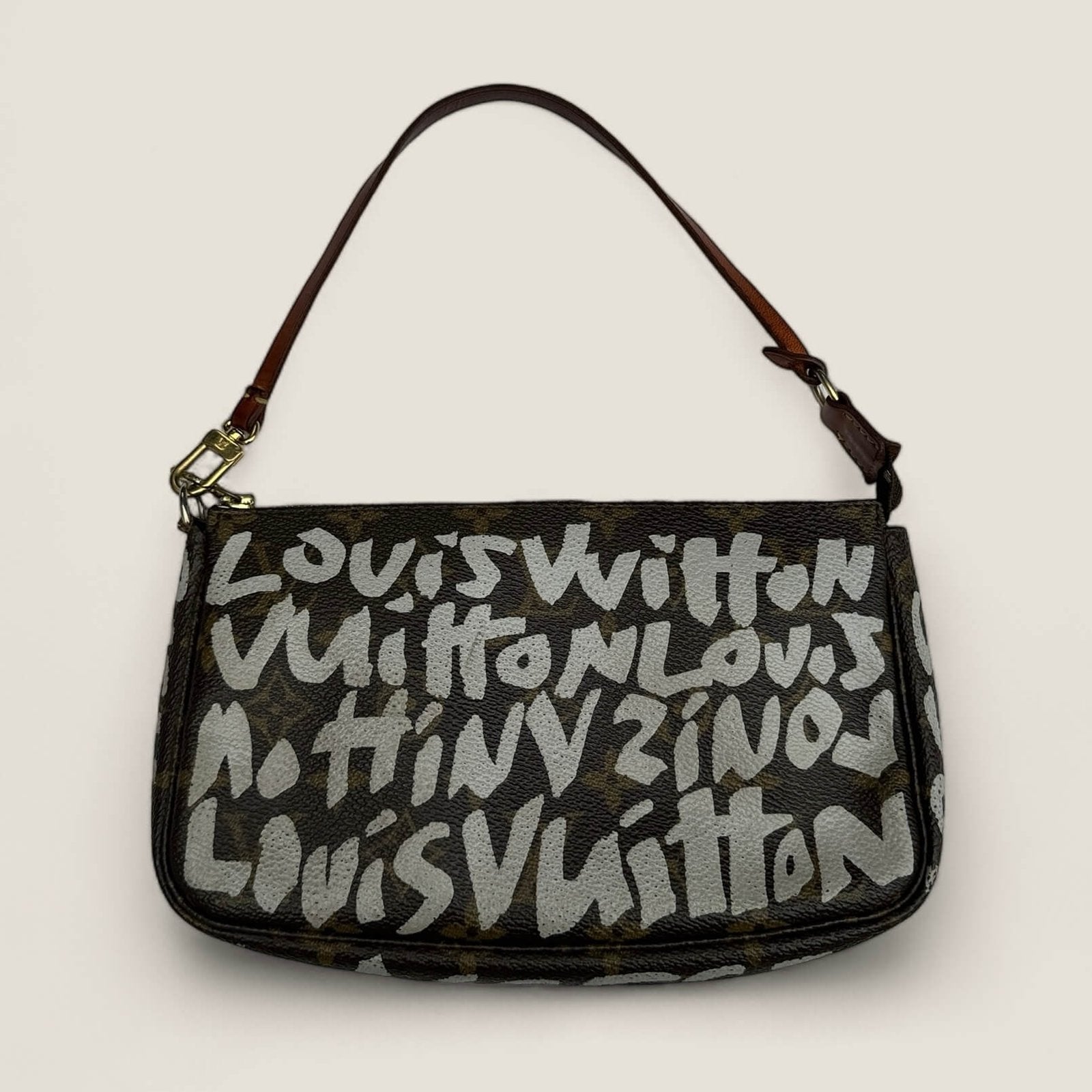 Pre-owned limited edition Louis Vuitton x Stephen Sprouse Graffiti Pochette Accessories from 2001