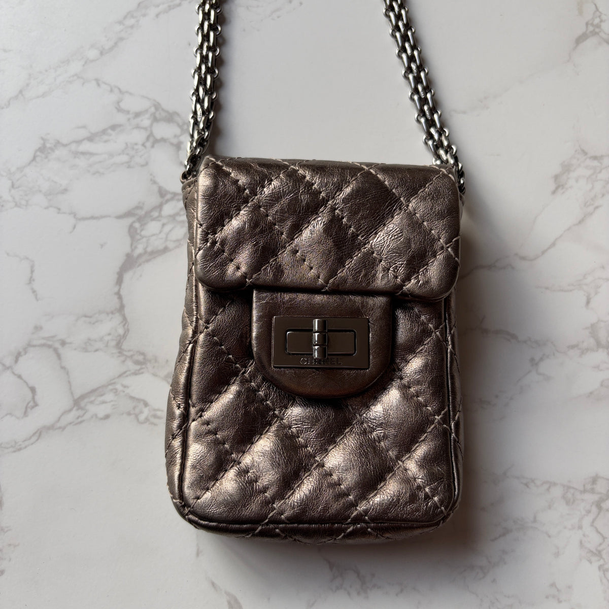 Pre-owned mini Chanel 2.55 flap bronze aged calfskin