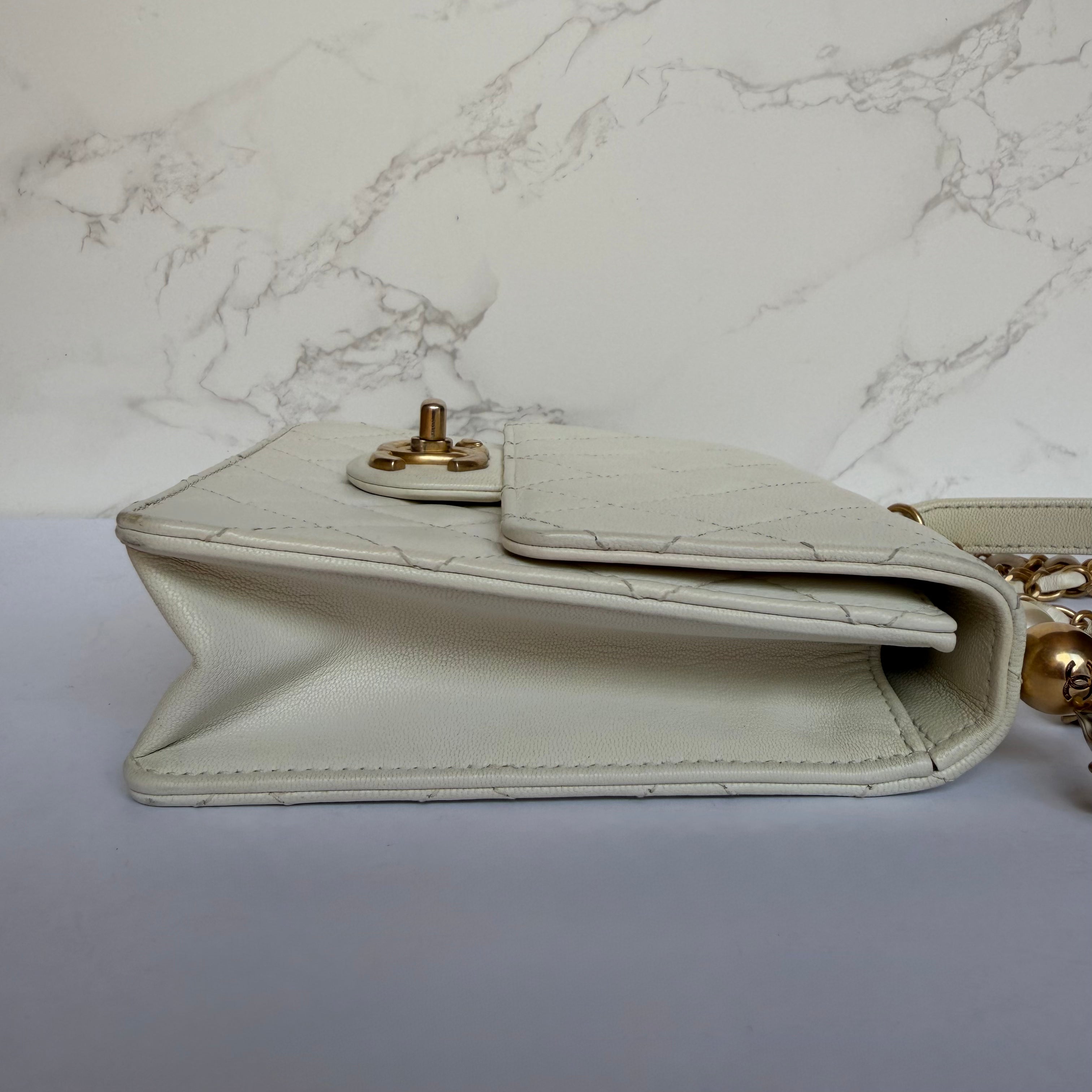 Chanel chic pearl flap bag