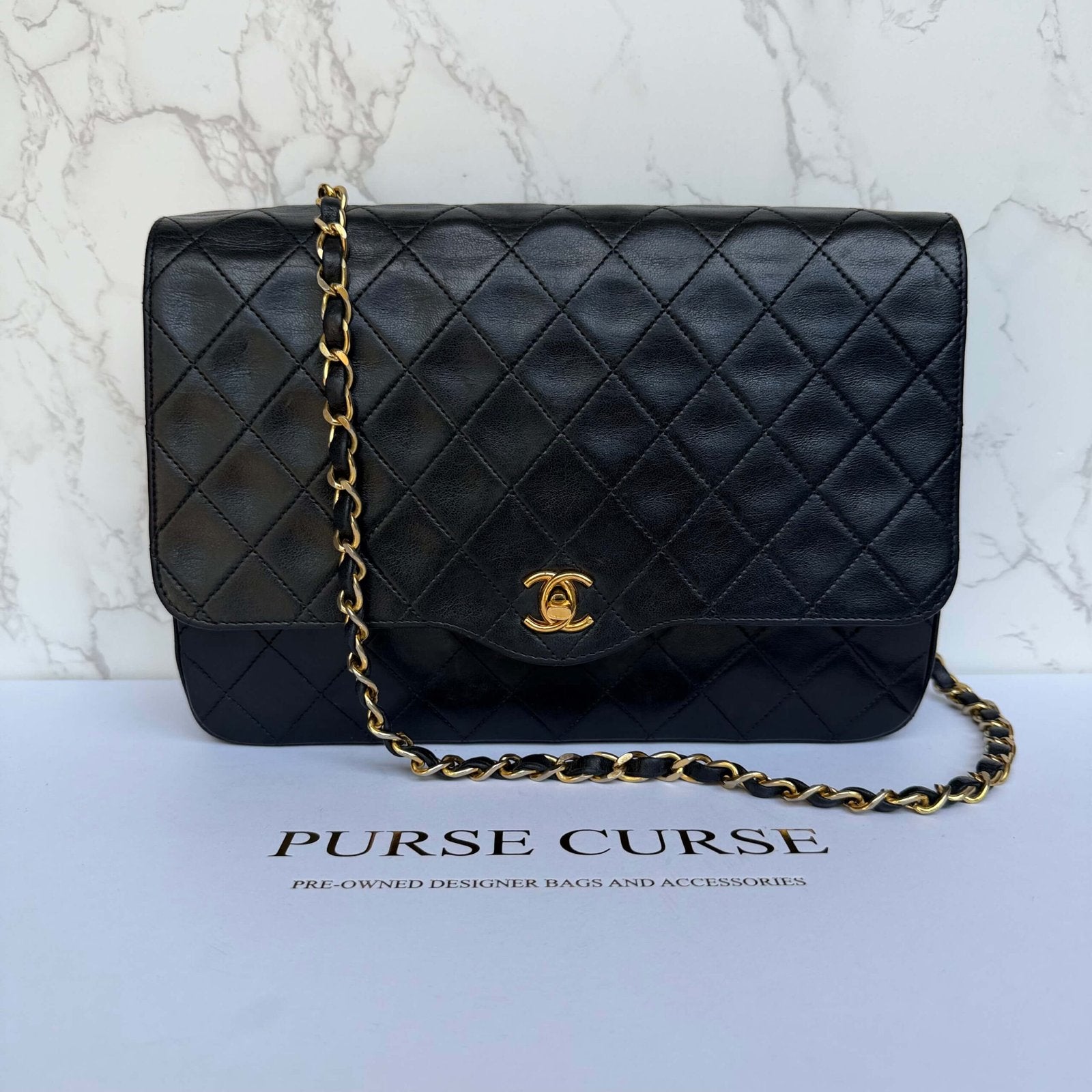 Purse Curse Chanel vintage matelassé single flap bag lamsleer