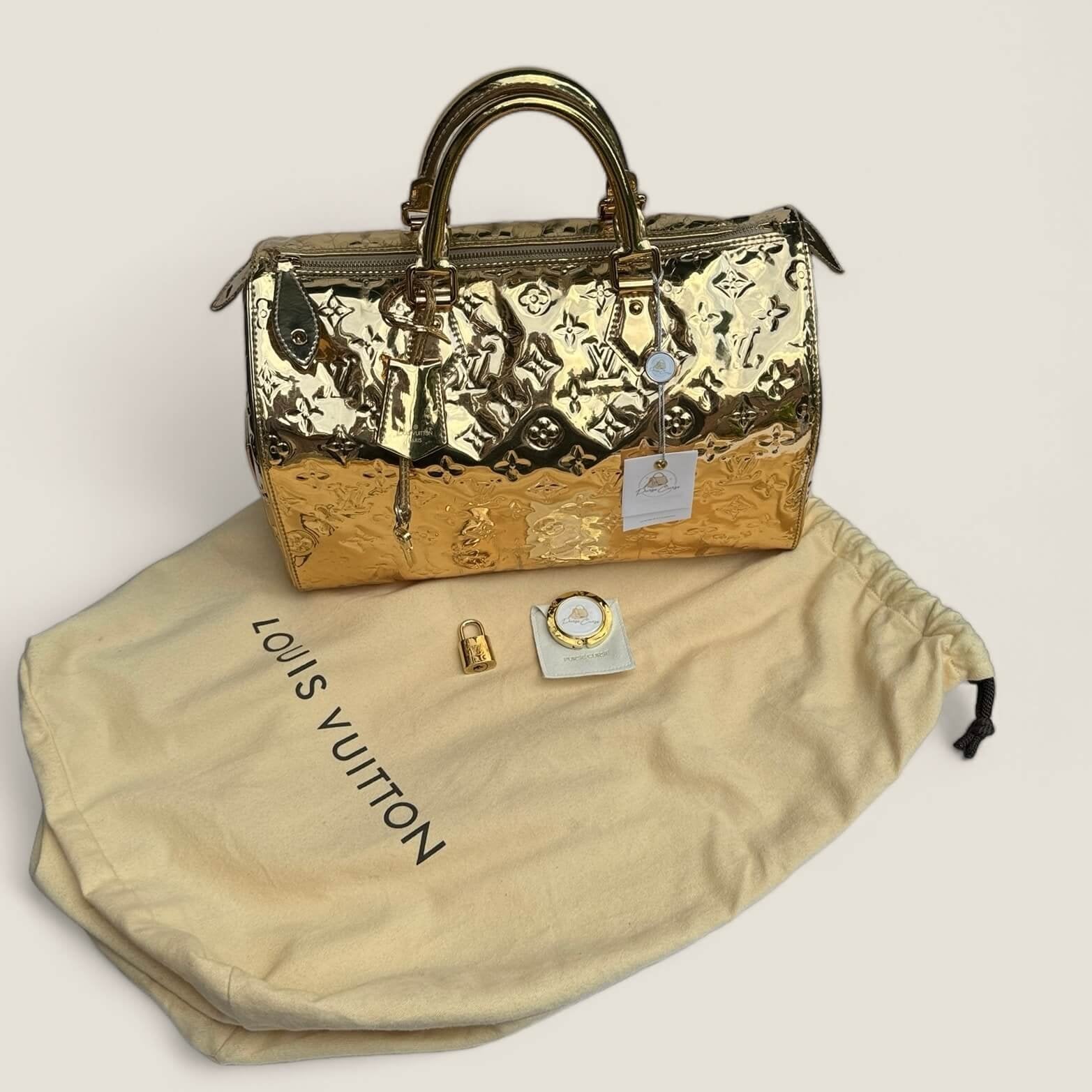 Purse Curse pre-owned Louis Vuitton miroir Speedy