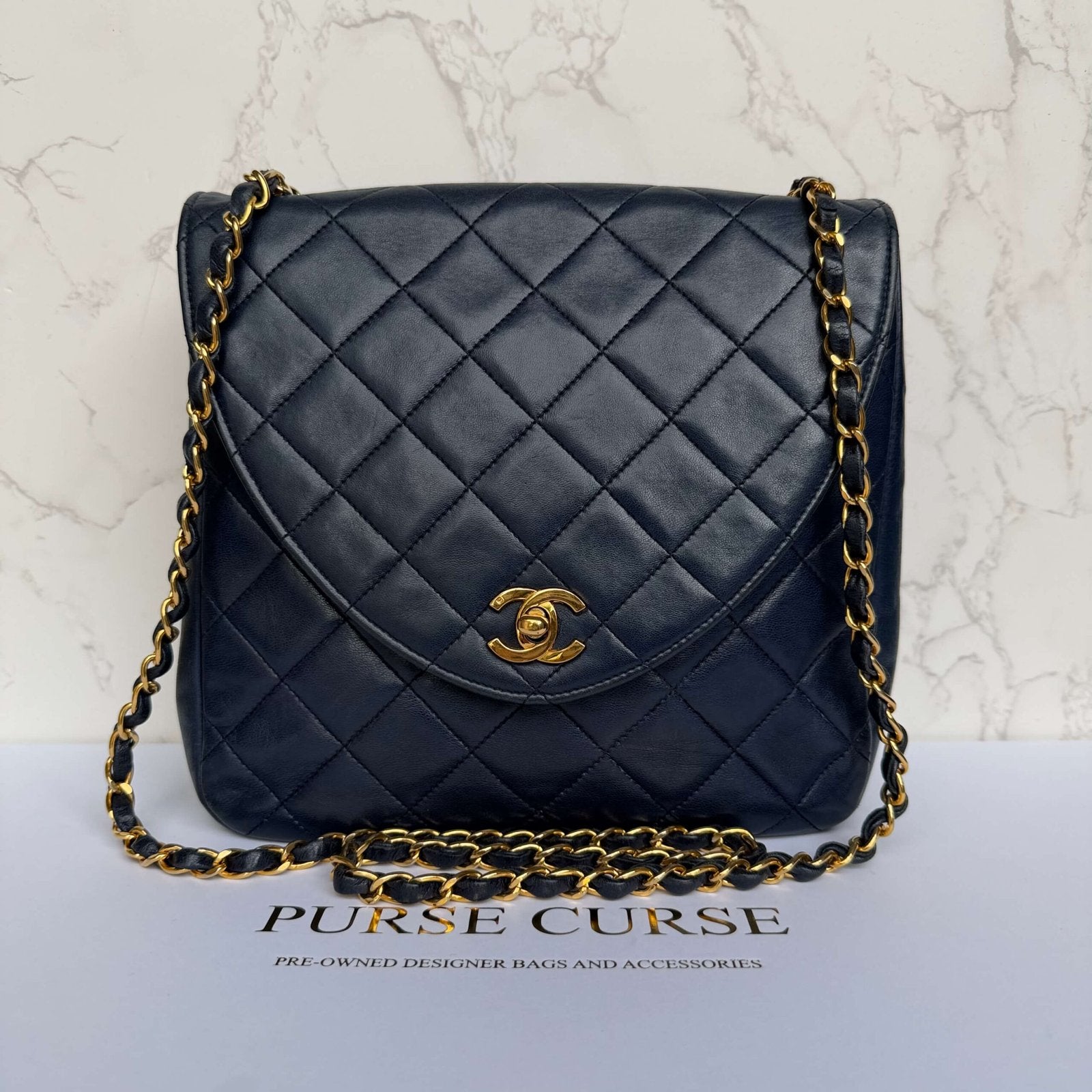 Tweedehands vintage crossbody flapbag donkerblauw