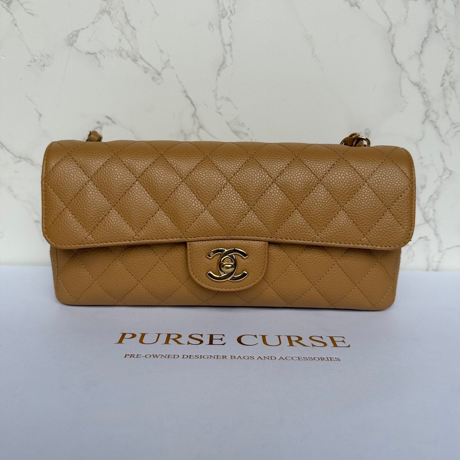 Vintage Chanel East West flap beige caviar