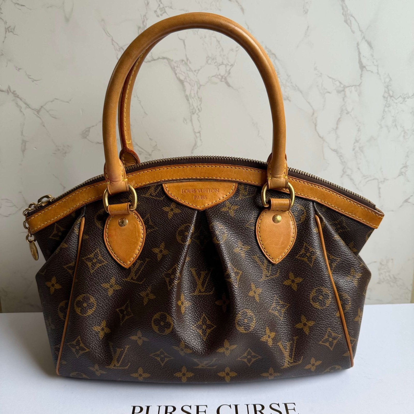 Vooraanzicht van Louis Vuitton Tivoli PM Monogram tas