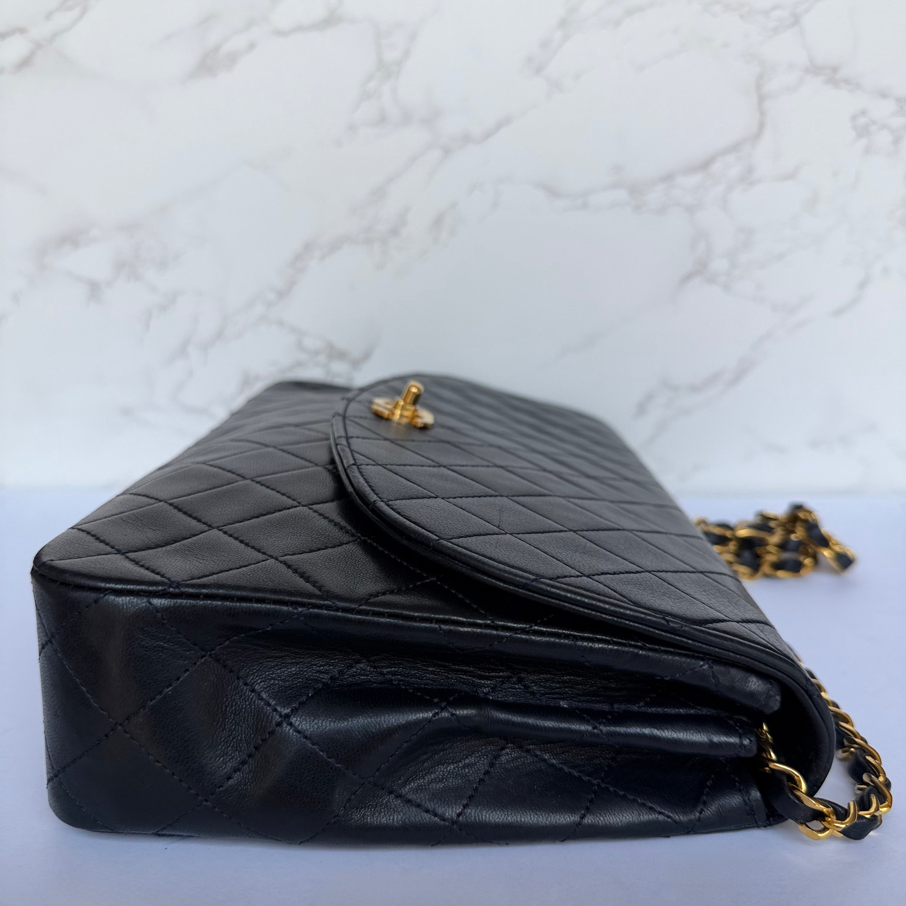 Side of authentic Chanel vintage shoulder bag