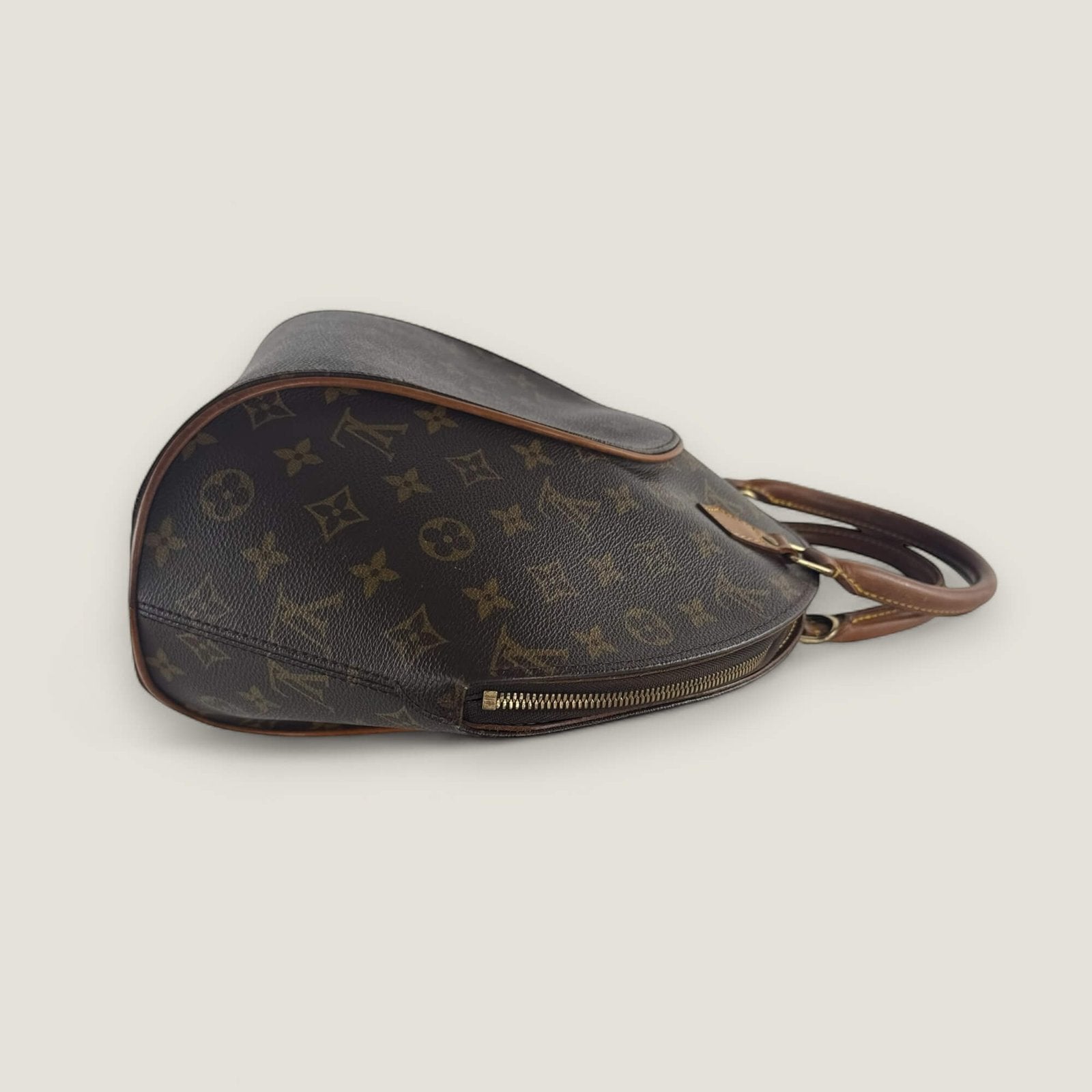 Side view of vintage Louis Vuitton handbag