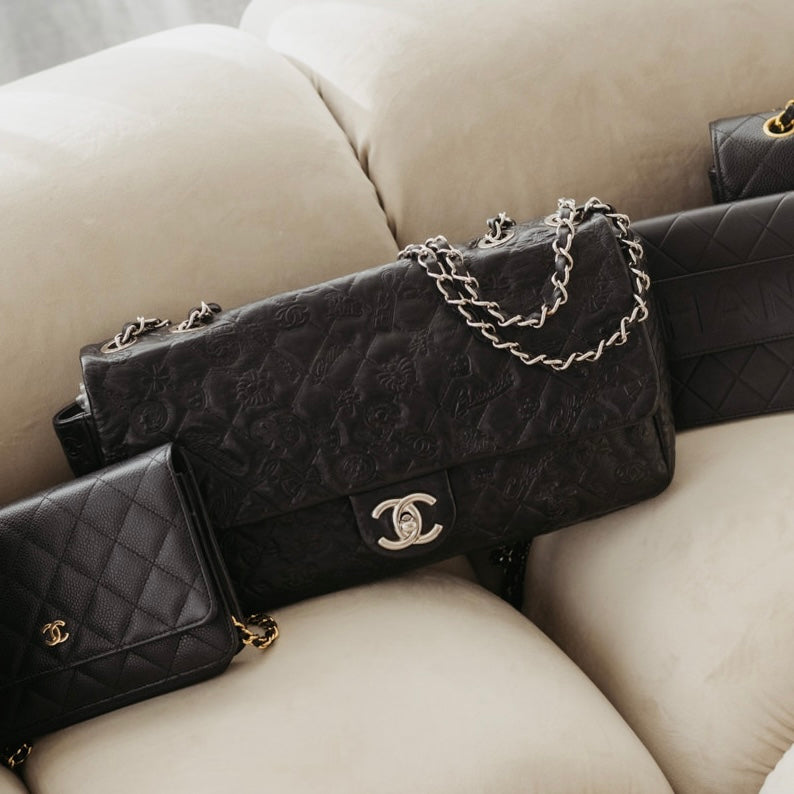 pre-owned Chanel jumbo embossed calfskin lucky symbols
