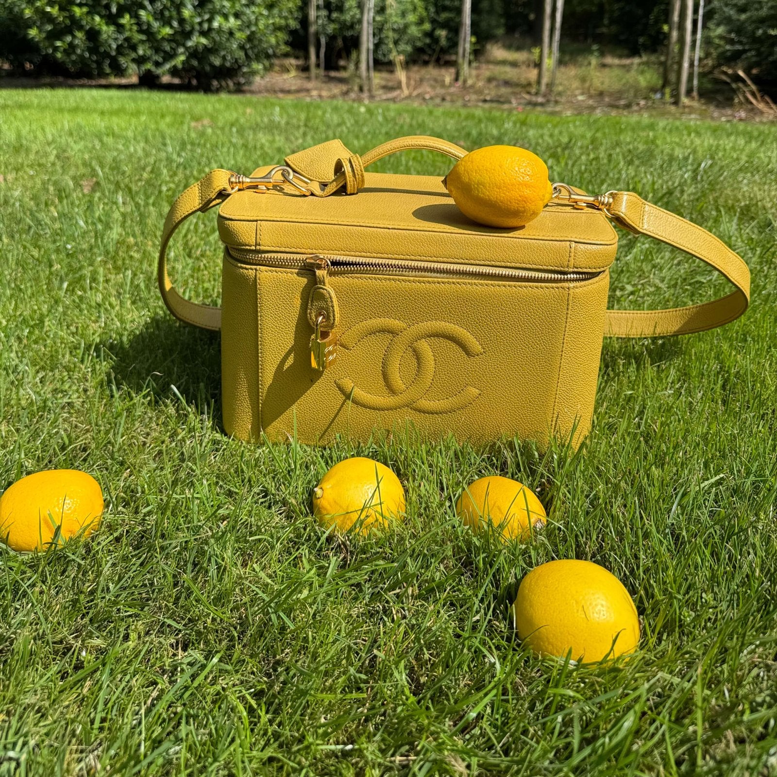 pre-owned Chanel lemon yellow Purse Curse