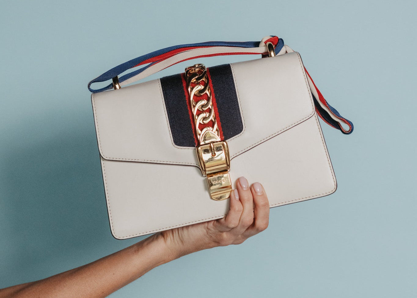 pre-owned designer bags under the 1000 white Gucci Sylvie