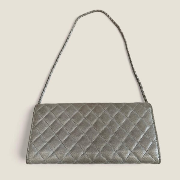 Chanel metallic silver East West flap clutch with Purse Curse bagholder