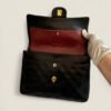 Chanel pre-owned tall medium flap black lamb leather with 24k gold hardware vintage