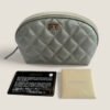 Pre-loved Chanel Cosmetica Pouch silver lambskin leather