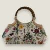 Tweedehands designer Gucci Bamboo bloemenprint handtas.