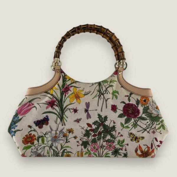 Tweedehands designer Gucci Bamboo bloemenprint handtas.