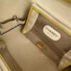 Chanel vintage vanity bag inside yellow