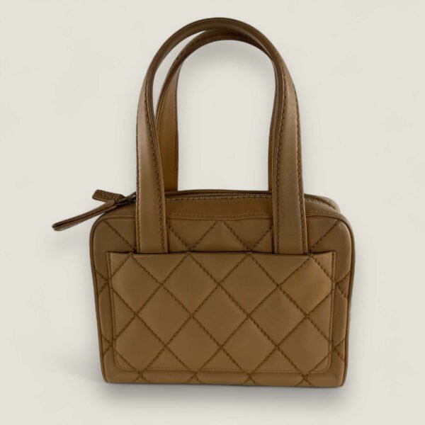 Hoekjes Chanel wild stitch handtas beige