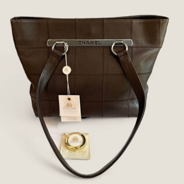 Preowned Chanel tote bag with Purse Curse bagholder table