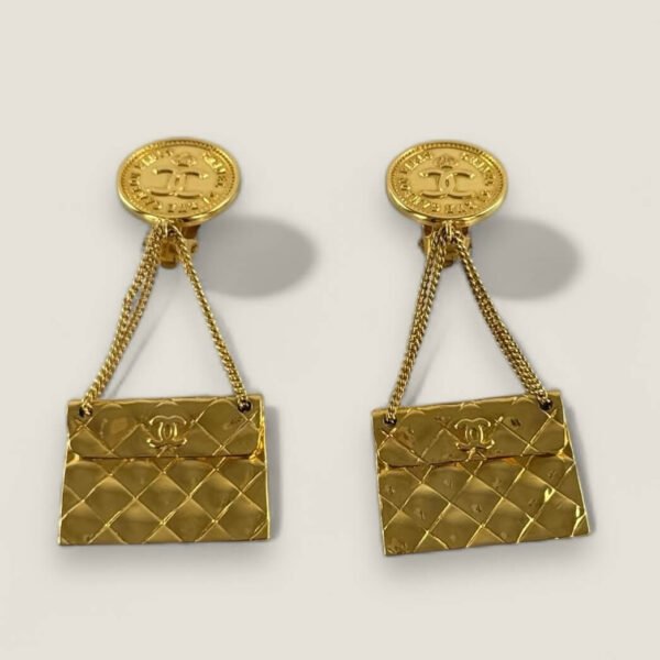 vintage Chanel clip on oorbellen handtas