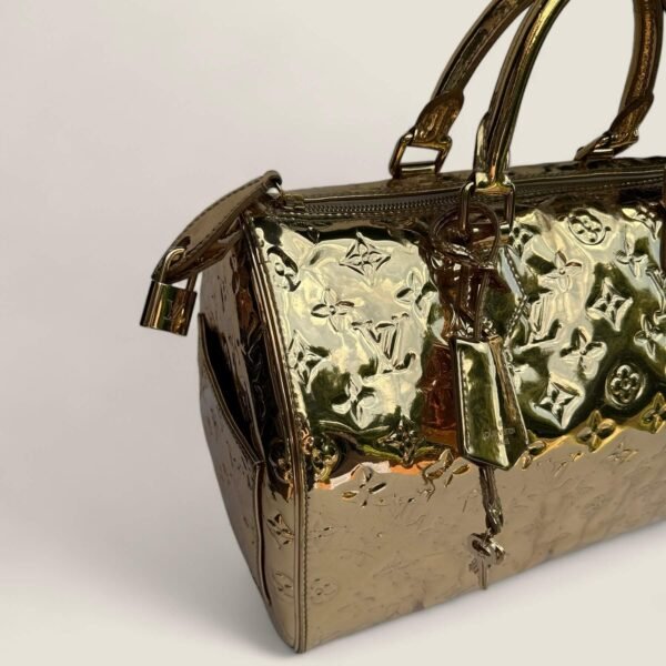 Gouden Louis Vuitton tas