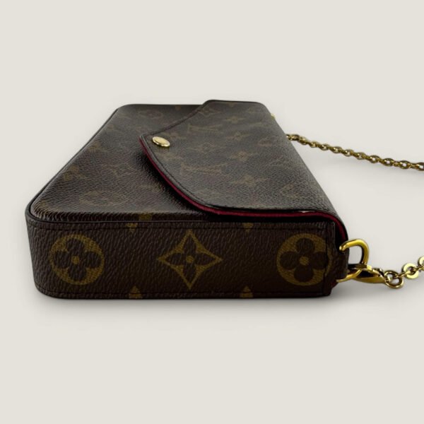 Louis Vuitton clutch on chain