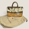 Louis Vuitton pre-loved gold monogram Miroir Speedy 35 gold leather