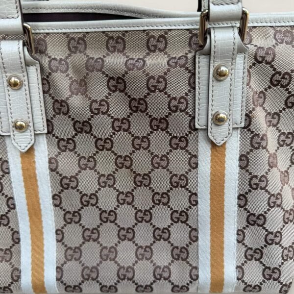 Achterkant originele Gucci tas vlekje